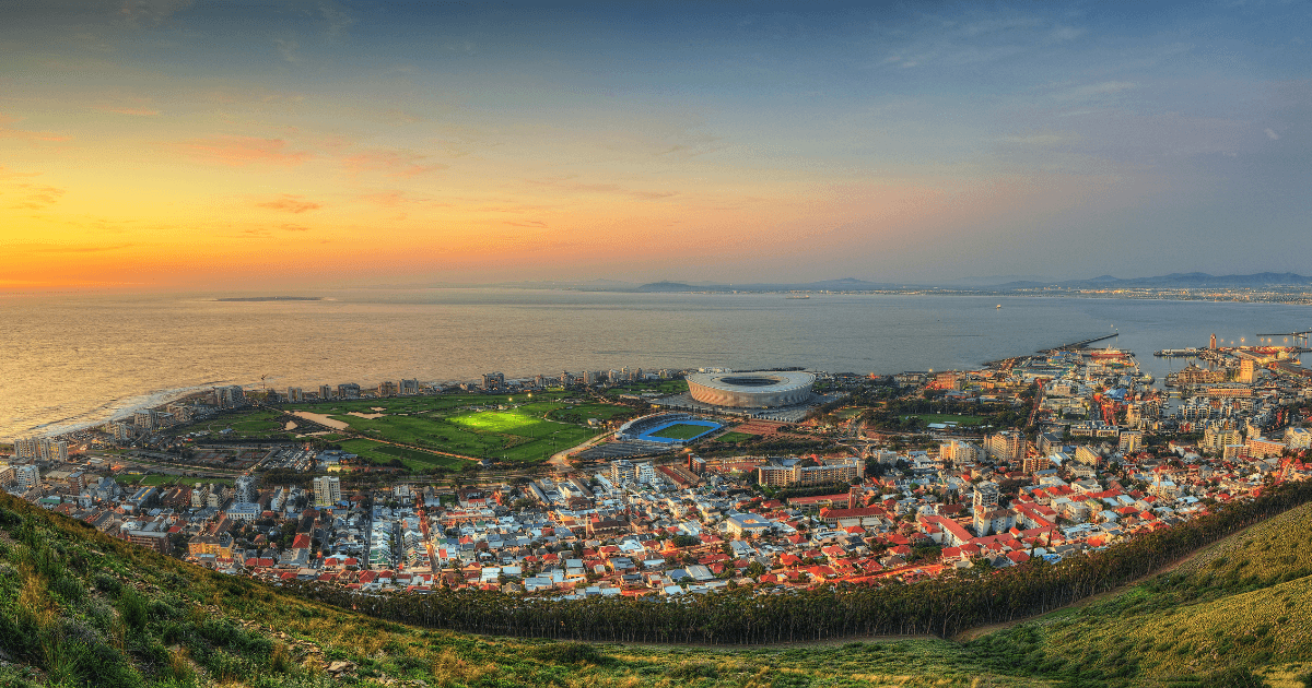 Panoramic view of Cape Town and the coastline at sunset